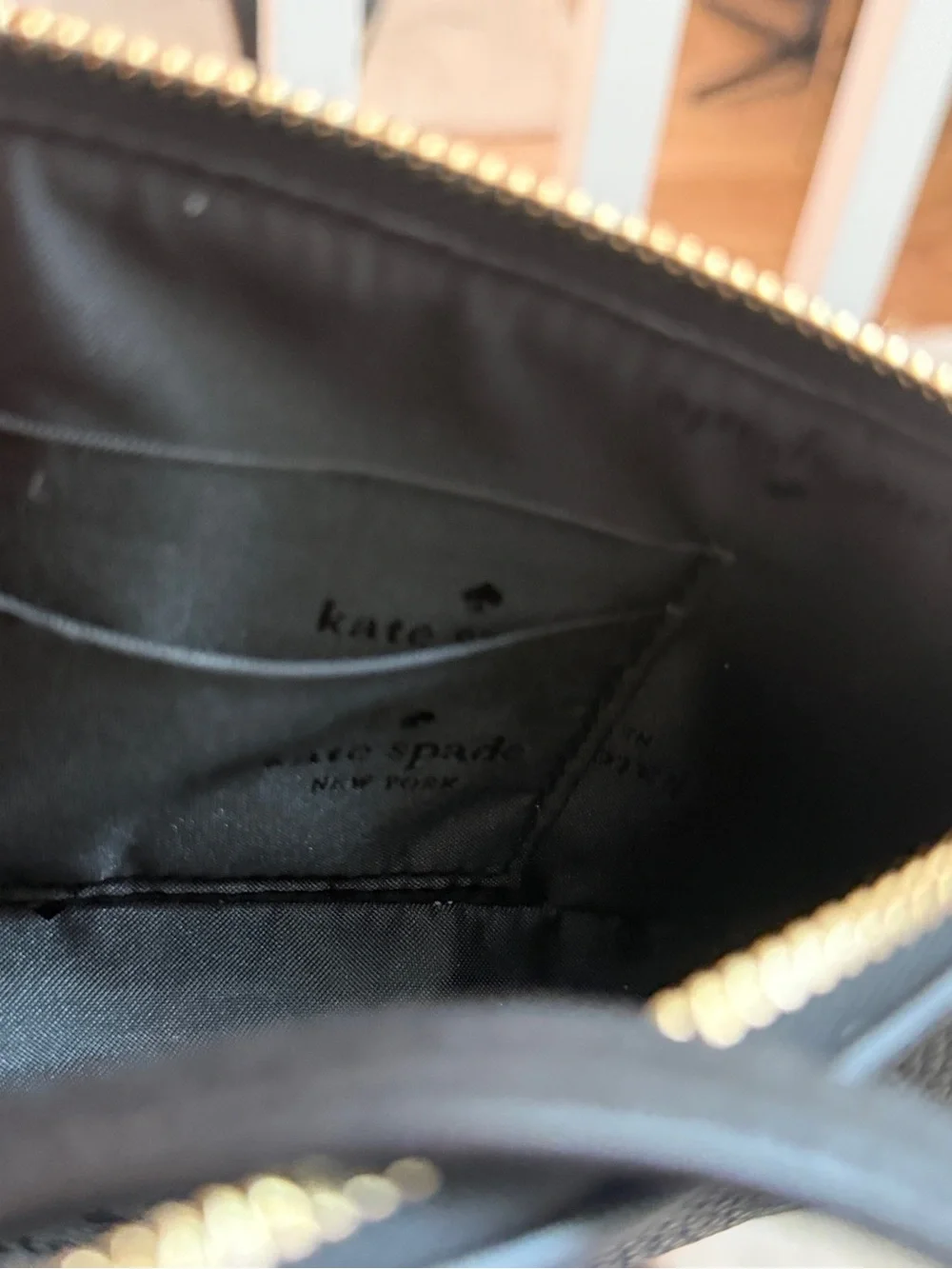 kate spade Black Pebbled Leather Mini Shoulder Pouch with Gold Spade Hardware